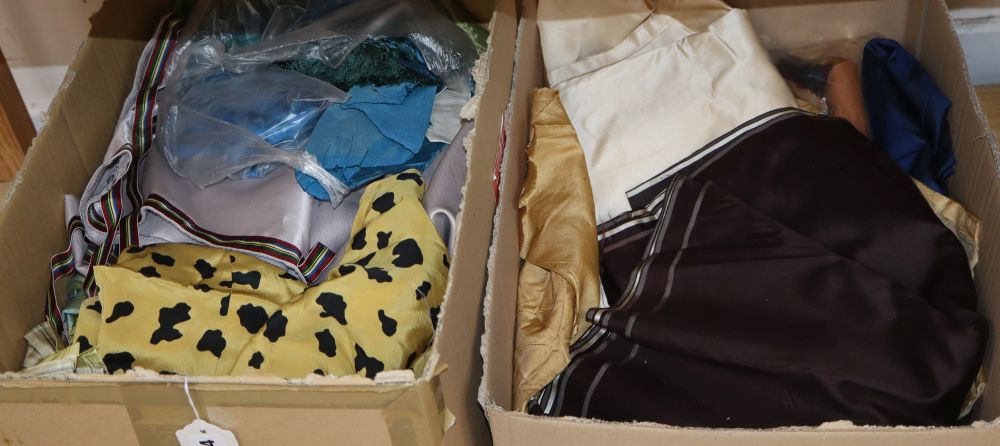 Two boxes of mixed fabrics